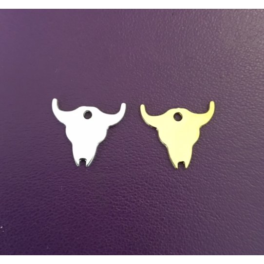 Small brass buffalo skull clad in France