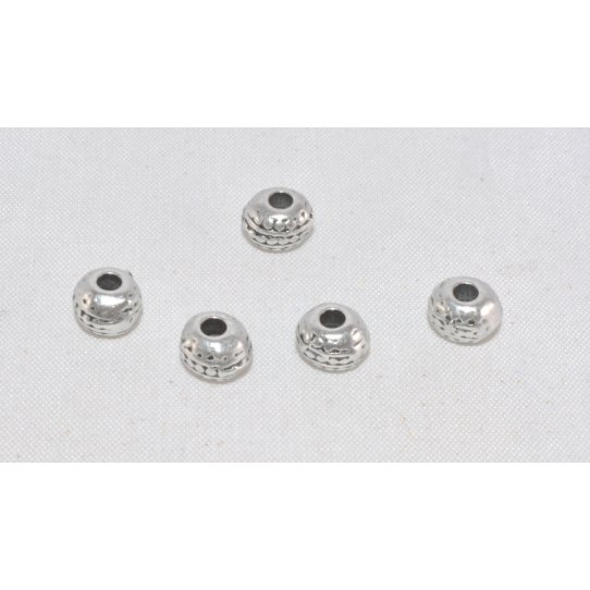 Perles avec motif 6.05 mm, trou diam : 1.70mm