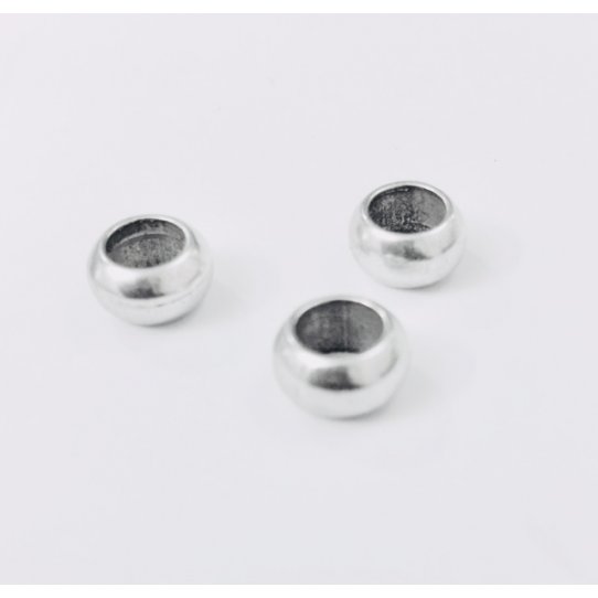 Perles en metal 8.70mm diam trou : 5mm