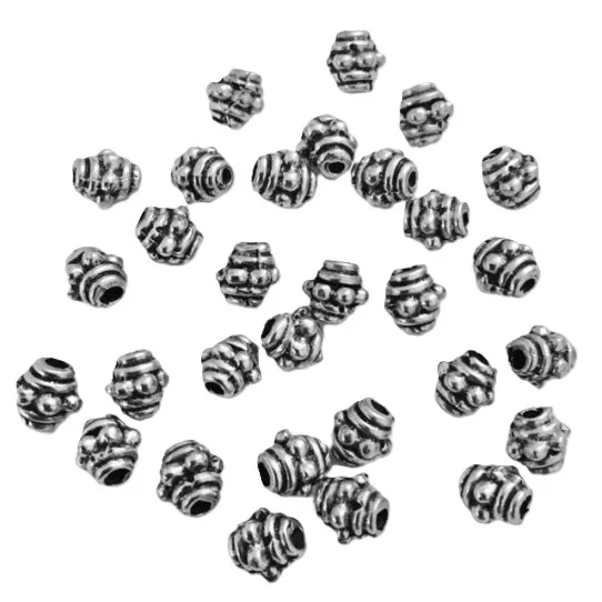 perles toupie avec motif de 5.50mm diamètre, trou 1.95mm