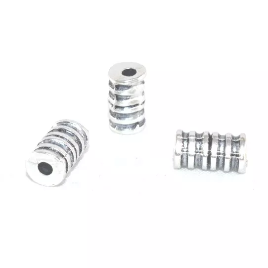 Intercalaire en forme cylindrique