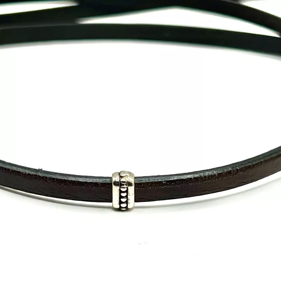 20 Passants 5mm en étain avec motif