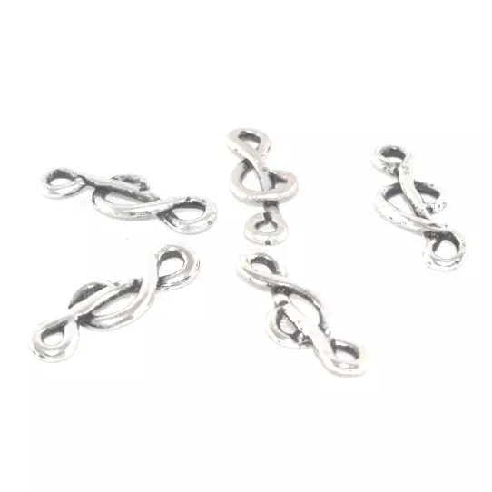 Intercalaire en forme de clé de sol