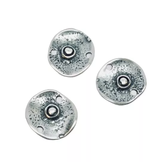 Intercalaire forme bouclier ovale deux trous