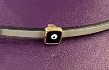 Passant mauvaise œil noir pour cuir 3mm - Or