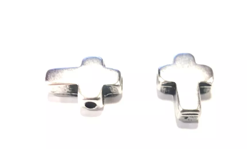 Intercalaire traversant croix